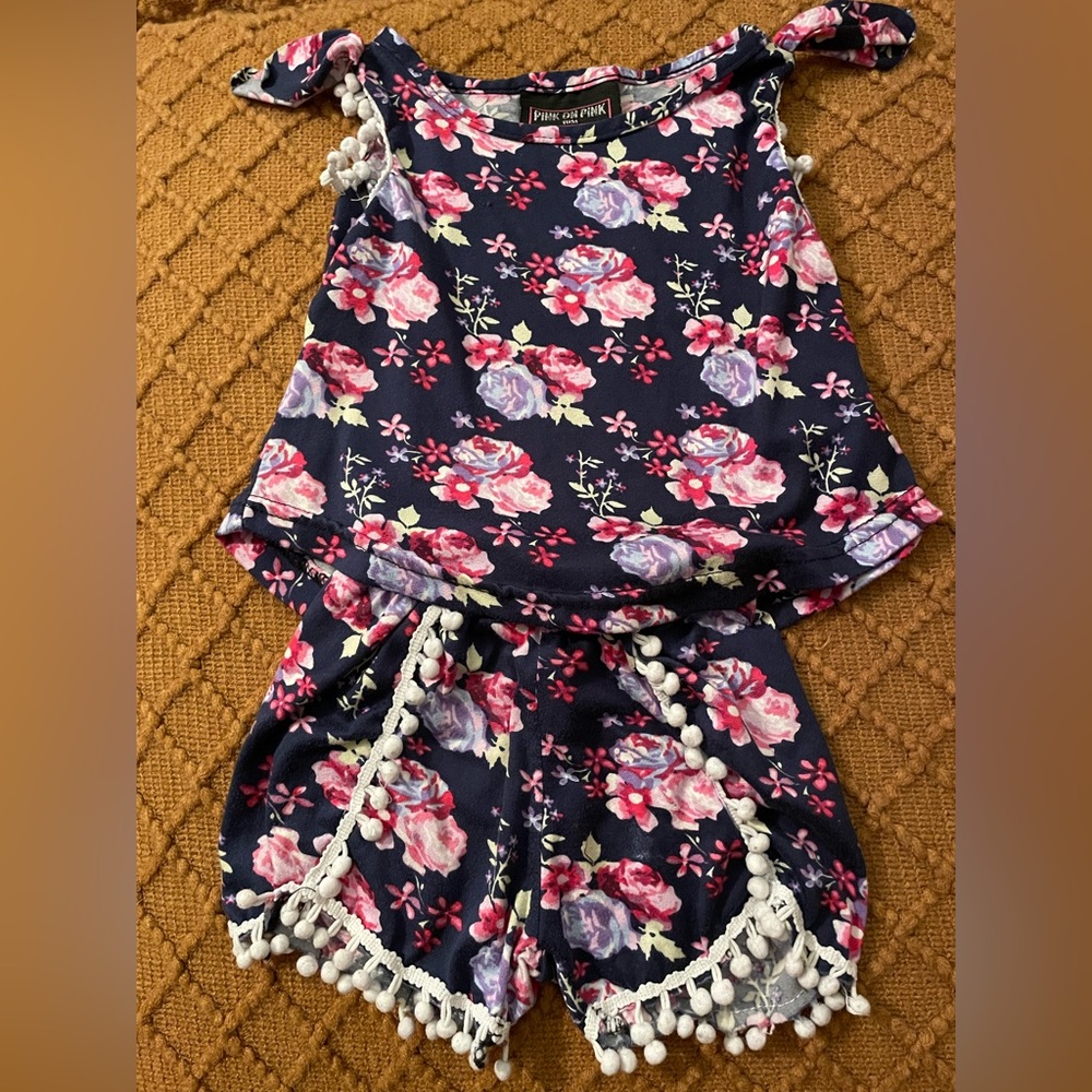 Pink on Pink 18 months navy blue shorts set with pink flowers all over it.